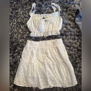 Akaiv white skirt and top set (top size S bottom size M)